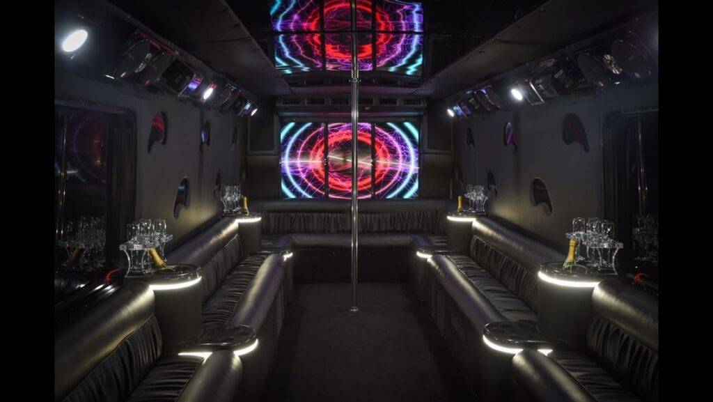 a party bus is decorated with neon lights.