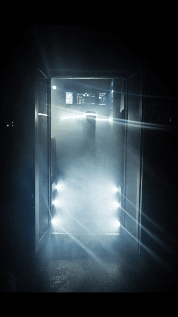 an open door in a party bus with light coming through.