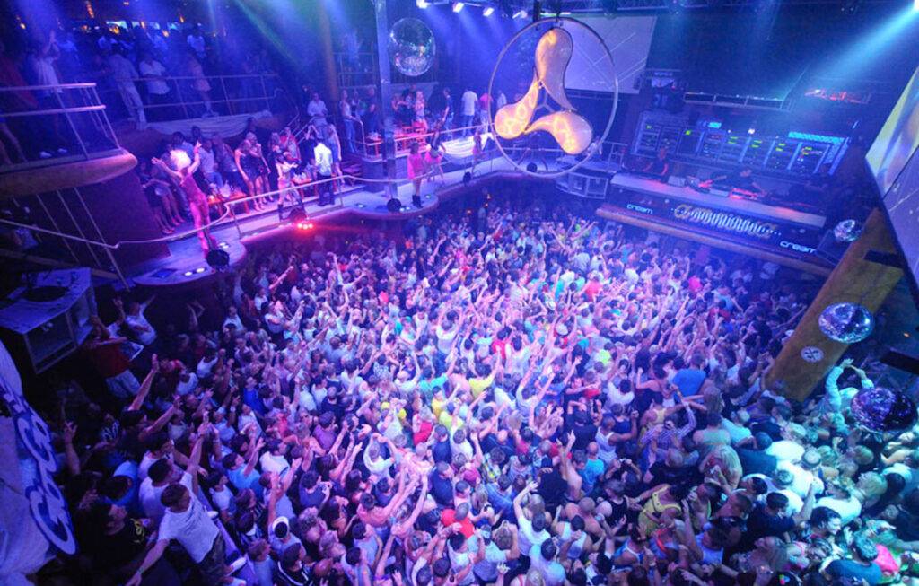 a large crowd of people at a nightclub.