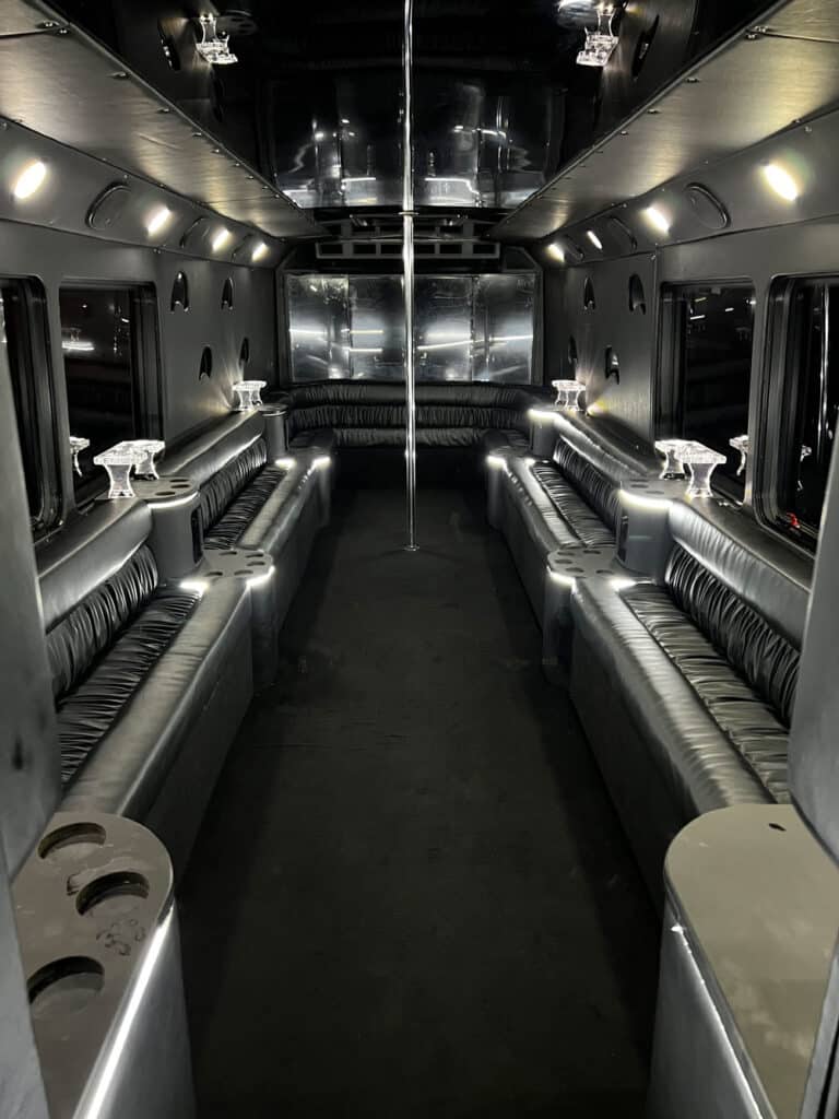 party bus with a bunch of seats in it.